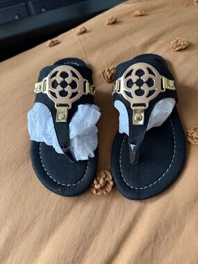 Black Sandals with Gold Medallion Accent. NWOT